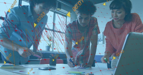 Leaning woman and two coworkers marking papers at bright workspace, with laptop and digital overlay