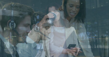 Leaning call agent wearing headset and shirt at corporate office, monitor, coffee cup, copy space