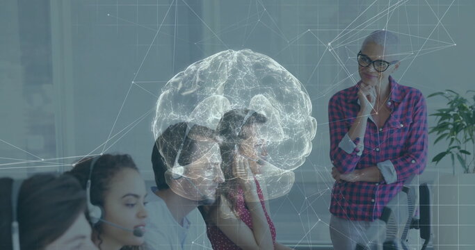 Projecting holographic brain network hovering above call center agents at office, with headsets