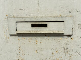 Old object. Rusty mailbox.