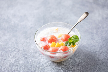 Trendy korean drink. Hwachae with watermelon and milk. Cold summer food