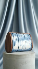 Crossbody purse with Japanese shibori textile on concrete surface – Ideal for fashion branding, artisan accessories, or minimalist editorial use