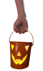 A child's hand holding a bucket to collect Halloween candy, with transparent background png