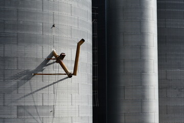 Large grain silos. Fill chute on side.