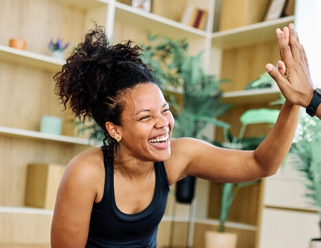 Young african american couple exrcising and having fun fitness mat floor at home - Powered by Adobe