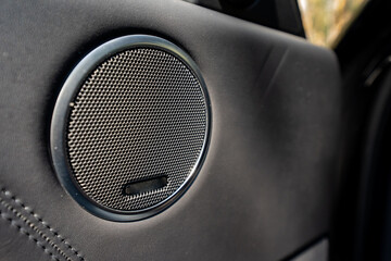 A closeup view of a highquality car door speaker designed to provide an enhanced audio experience...