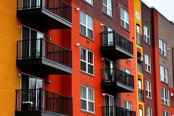 Balconies of a colorful apartment building create urban chaos