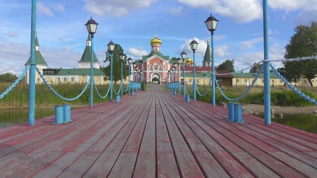 View of the Valdai Iversky Bogoroditsky svyatoozersky monastery. Sunny June day . Russia,Ancient Russian Iversky Monastery at Valdaysky National Park.