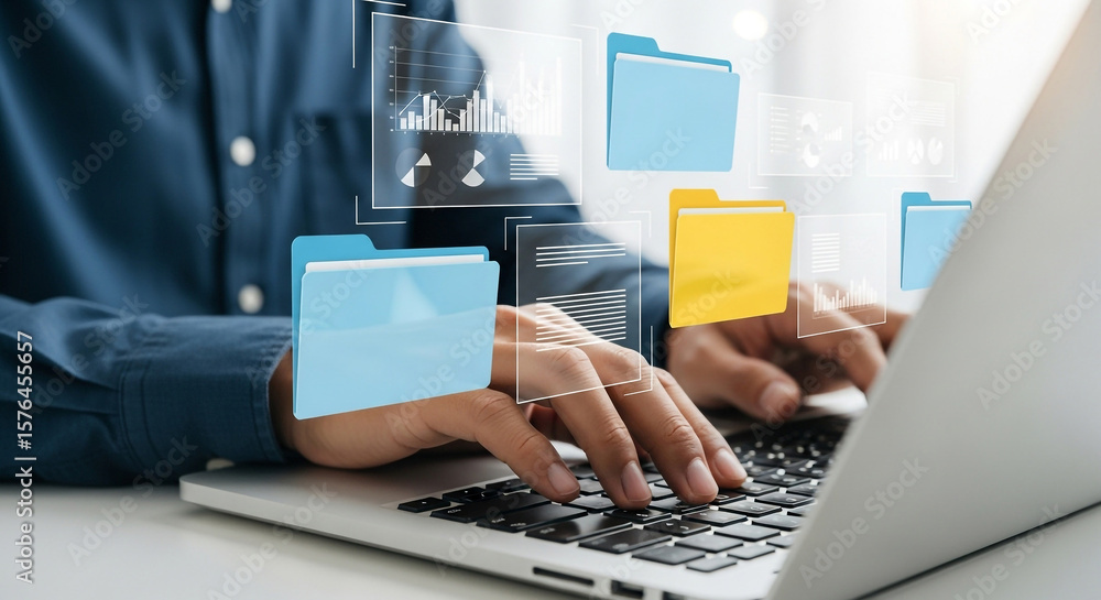 Poster a person is managing digital files and folders on a laptop, showcasing data management and organizat