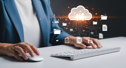 A person is using a computer with a cloud computing interface, illustrating data storage and online file transfer with secure network connections