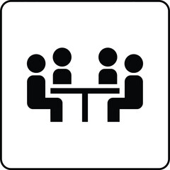 Simple black and white icon of four people seated around a table, suggesting a meeting or discussion.