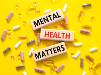 Mental Health Matters symbol. Concept words Mental Health Matters on wooden blocks. Beautiful...