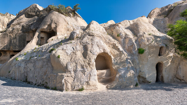 Ancient Chapel of St. Basil, aka Aziz Basil Sapeli, at Goreme, in a UNESCO site in Cappadocia, Turkey. Historic rock-cut church carved into volcanic tuff formations