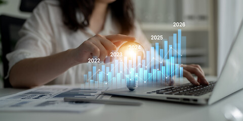 Business bar chart and line graph showing yearly business growth from 2022 to new year 2026, represent data analytics, future 2026 planning, business 2026 trend, and performance analysis 2026 Latch