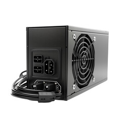 Computer power supply unit with cables and fan on white background  
