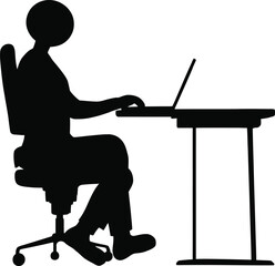 Silhouette of person sitting at desk with laptop working or browsing the internet in an office space
