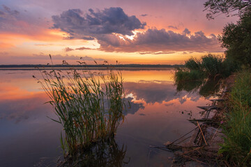 sunrise on the lake after rain