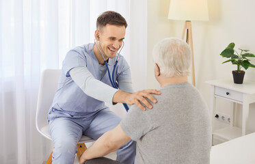 Senior aged man at home, shoulder supporting young doctor, nurse taking care of old patient medical...