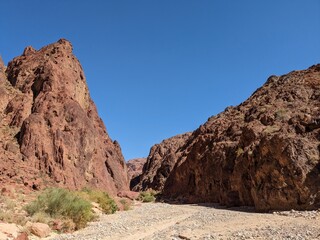 Fototapeta premium Jordan Trail long distance hiking from Dana Valley to Petra and Wadi Rum.Wadi Rum Desert, Jordan. The red desert and Jabal Al Qattar mountains,Arabia