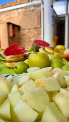 Colorful Summer Fruit and Snack Table Outdoors for a Fresh and Healthy Gathering