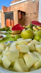 Colorful Summer Fruit and Snack Table Outdoors for a Fresh and Healthy Gathering