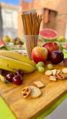Colorful Summer Fruit and Snack Table Outdoors for a Fresh and Healthy Gathering