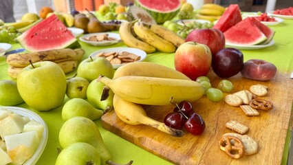 Colorful Summer Fruit and Snack Table Outdoors for a Fresh and Healthy Gathering