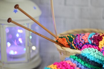 Knitting in process multicolor thing and needles handmade craft gobby photo	
