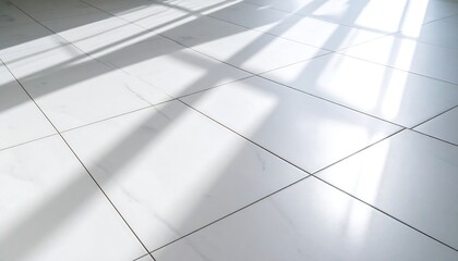 Sunlight casts shadows on white tiles