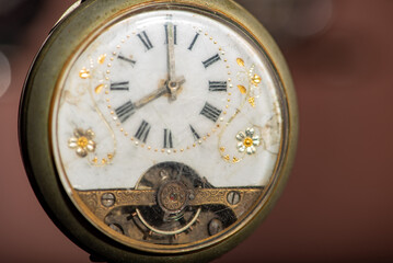 Pocket watch, beautiful and antique pocket watches hanging in front of an abstract background,...