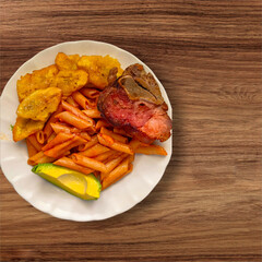 g A delicious meal: pasta, fried pork chop, avocado, and fried plantains. From the Dominican Republic 