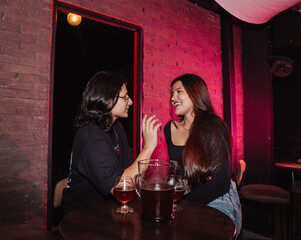 couple in love sitting in a bar drinking beer