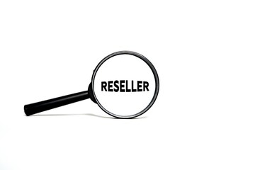 The word RESELLER on a magnifying glass isolated on a white background.