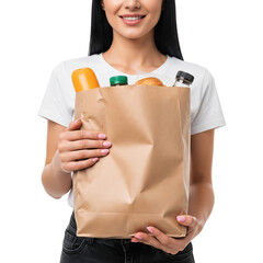 Young cheerful woman hold brown paper bag with food products on Isolated transparent background png. generated with AI