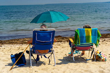 two seniors at the beach