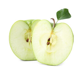 Halves of fresh green apple with leaf isolated on white