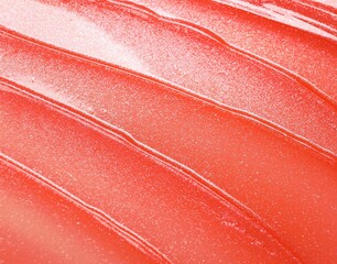 Texture of orange lip gloss as background, top view