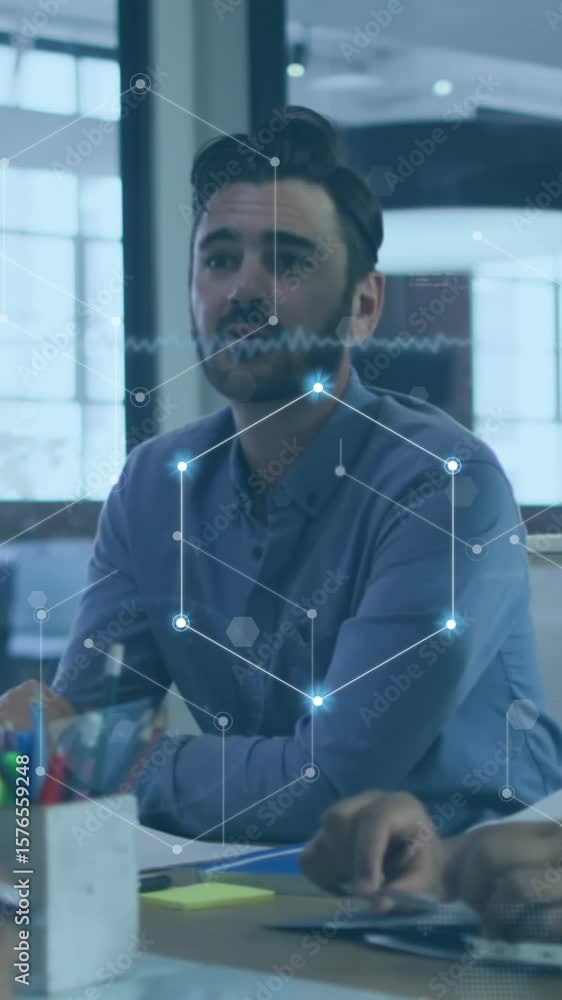 Poster animation of connected dots forming hexagons over diverse man discussing with colleagues in meeting