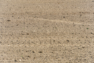 A freshly plowed agricultural field. Preparation of the soil for sowing wheat.
