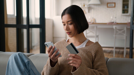 Caucasian hispanic woman thoughtful pensive girl female homeowner buyer shopper shopping online...
