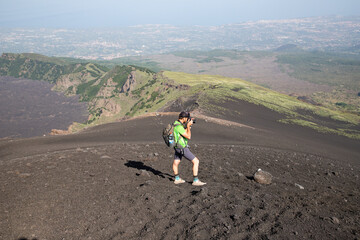 hiker trekking on mount Etna