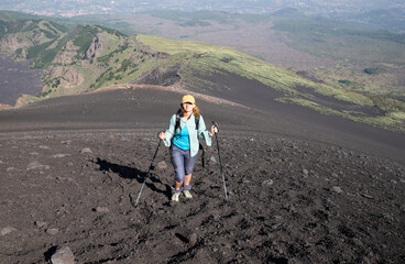 hiker trekking on mount Etna