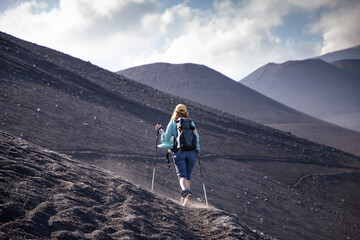 hiker trekking on mount Etna