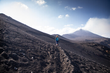 hiker trekking on mount Etna