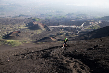 hiker trekking on mount Etna