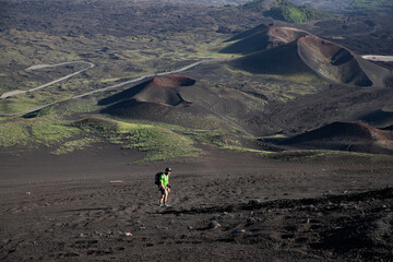hiker trekking on mount Etna