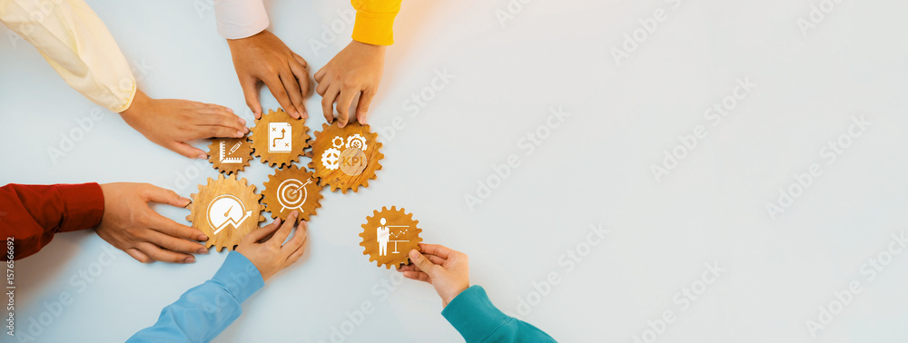 Poster a dynamic overhead view of diverse hands collaborating to arrange gears with various icons, symboliz