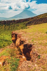 Scenic view of Mount Ol Doinyo Lengai seen from Makonde plateau in Ngorongoro Conservation Area in Tanzania 