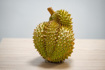 Fresh durian on wooden table
