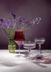 Refreshing summer cocktails with lavender bouquet creating a relaxing atmosphere
